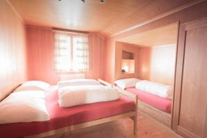 Postel nebo postele na pokoji v ubytování Chalet Aurora