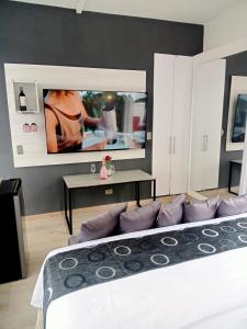 Postel nebo postele na pokoji v ubytování Mirador samsara Penthouse con Jacuzzi al aire libre,piso completo