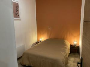 Postel nebo postele na pokoji v ubytování Charmante Maison Wicroise