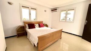 Spacious 2-Floor Apt in Lavandolive Residence客房内的一张或多张床位