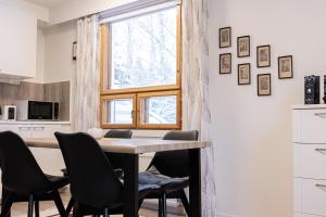 Kuchyň nebo kuchyňský kout v ubytování Santa's Suite II by BookLapland