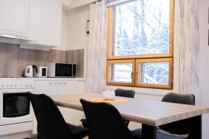Kuchyň nebo kuchyňský kout v ubytování Santa's Suite II by BookLapland + 10 fotografií