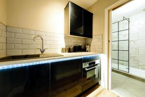 Køkken eller tekøkken på The Willow studio 1 + 4 billeder