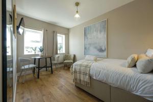 En eller flere senge i et værelse på The Willow studio 1