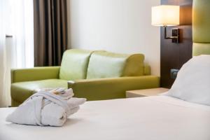 Postel nebo postele na pokoji v ubytování Kona Hotel Verona by Kleos Group Collection