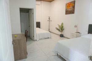 Postel nebo postele na pokoji v ubytování Cabinas La Sirena