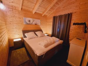Ένα ή περισσότερα κρεβάτια σε δωμάτιο στο Ferienhaus ST7