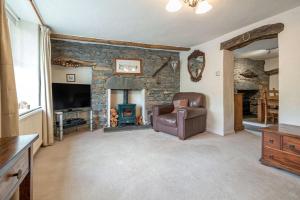 Et tv og/eller underholdning på Bens Row Cottage, The Lake District