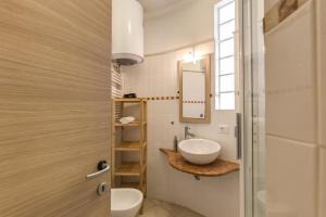 Ванная комната в Aurelia Vatican Apartments +56 фотографий