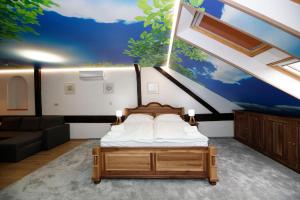 Postel nebo postele na pokoji v ubytování Hotel & wellness Hejtmanka