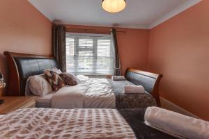 Voodi või voodid majutusasutuse 3-Bed House Sleeps 6 Free Parking Wifi toas +6 fotot