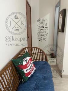 Postel nebo postele na pokoji v ubytování Apartamento Coração de capão 100mt do mar