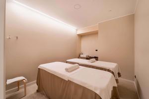Voodi või voodid majutusasutuse Best Western Plus The Hub Hotel toas