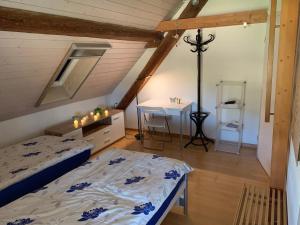 Postel nebo postele na pokoji v ubytování BnB Lindenacker