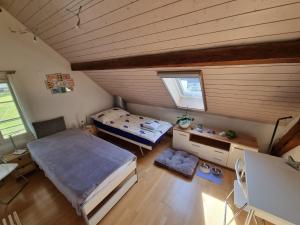 Voodi või voodid majutusasutuse BnB Lindenacker toas