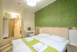 Postel nebo postele na pokoji v ubytování Urban Hotel