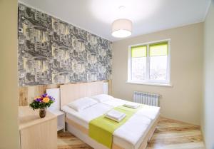 Postel nebo postele na pokoji v ubytování Urban Hotel