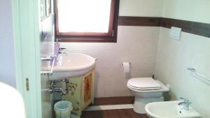 Koupelna v ubytování B&B "Corte San Tomaso"