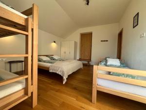 Postel nebo postele na pokoji v ubytování Chata Pod Skalkami