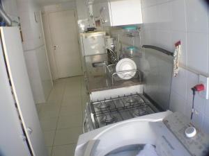 a small bathroom with a sink and a toilet at Dolce Vita Residence in Rio de Janeiro +33 photos