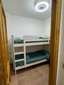 A bed or beds in a room at ALGHERO SUN & SEA - Spiaggia a 50 metri