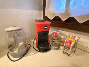 A kitchen or kitchenette at Bellagio Cool Flat - Private Parking & Rooftop terrace