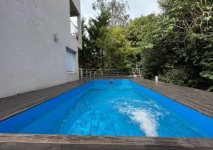 Swimmingpoolen hos eller tæt på Duplex en Pinamar