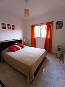 Postel nebo postele na pokoji v ubytování Ph Los pichis Santa Teresita