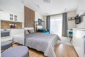 Kuchyň nebo kuchyňský kout v ubytování Apartment Mona