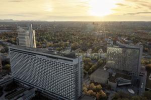 an aerial view of a city with tall buildings at The Westin Grand Munich in Munich
