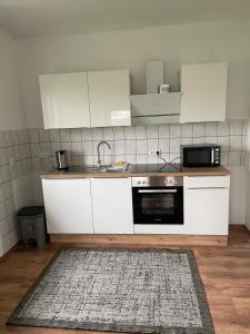 Kuchyň nebo kuchyňský kout v ubytování Porta Vista - Perfekte Lage, entspannter Aufenthalt