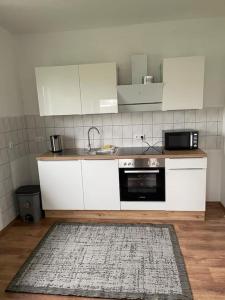 Kuchyň nebo kuchyňský kout v ubytování Porta Vista - Perfekte Lage, entspannter Aufenthalt