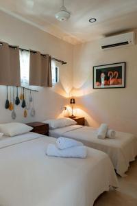 Postel nebo postele na pokoji v ubytování Casa AMI + 22 fotografií