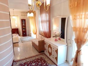 A bed or beds in a room at Prime Luxury Villa beach front