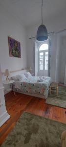 Cama ou camas em um quarto em Casarão AL