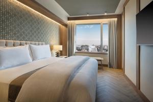 Postel nebo postele na pokoji v ubytování The Westin Madrid Cuzco