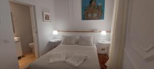 Cama ou camas em um quarto em Casarão AL