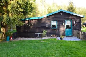 Vrt pred nastanitvijo Chalet de Papitou , situé dans un coin de paradis
