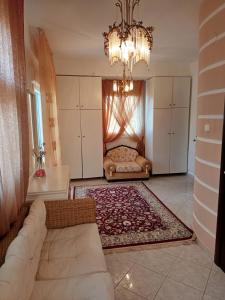 A bed or beds in a room at Prime Luxury Villa beach front