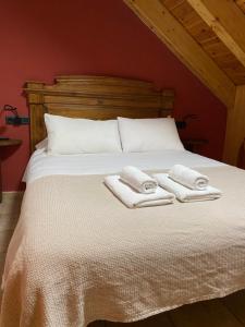 Postel nebo postele na pokoji v ubytování Apartamentos Fogaron
