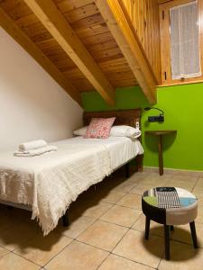 Postel nebo postele na pokoji v ubytování Apartamentos Fogaron