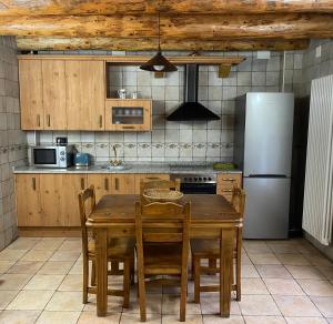 Kuchyň nebo kuchyňský kout v ubytování Apartamentos Fogaron