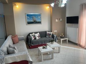 TV a/nebo společenská místnost v ubytování Sofias Cottage Trikala