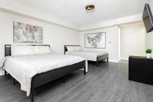 Postel nebo postele na pokoji v ubytování G Hotel