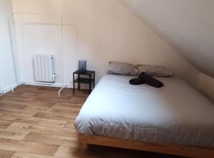 Postel nebo postele na pokoji v ubytování ღ Delfosse - 3 chambres, extérieur et Wifi Fibre