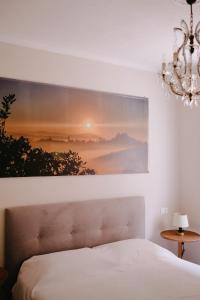 Postel nebo postele na pokoji v ubytování Residenza Menta CASA GUARNONE