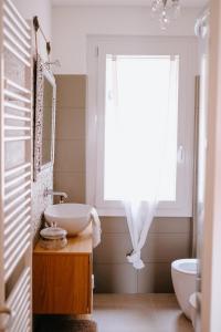 Koupelna v ubytování Residenza Menta CASA GUARNONE