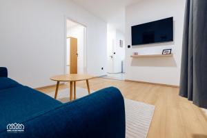 A television and/or entertainment centre at BORG Apartmanok