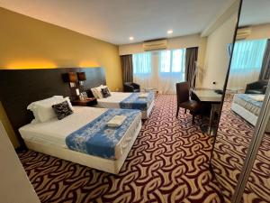 Faina Homestay SCSP Ming Resident房間的床