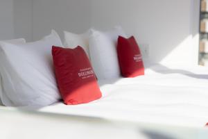 Ένα ή περισσότερα κρεβάτια σε δωμάτιο στο CUVEE J2 HOTEL OSAKA by Onko Chishin